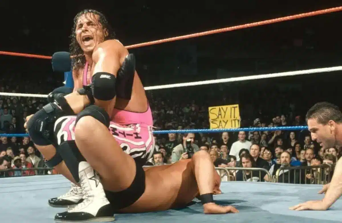 Bret Hart performing Sharpshooter on an opponent