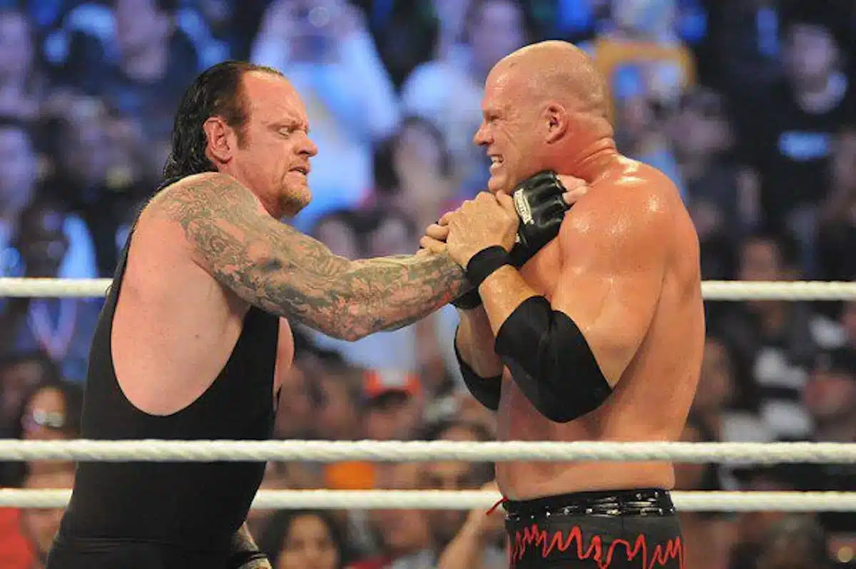 Undertaker performing a Chokeslam on Kane