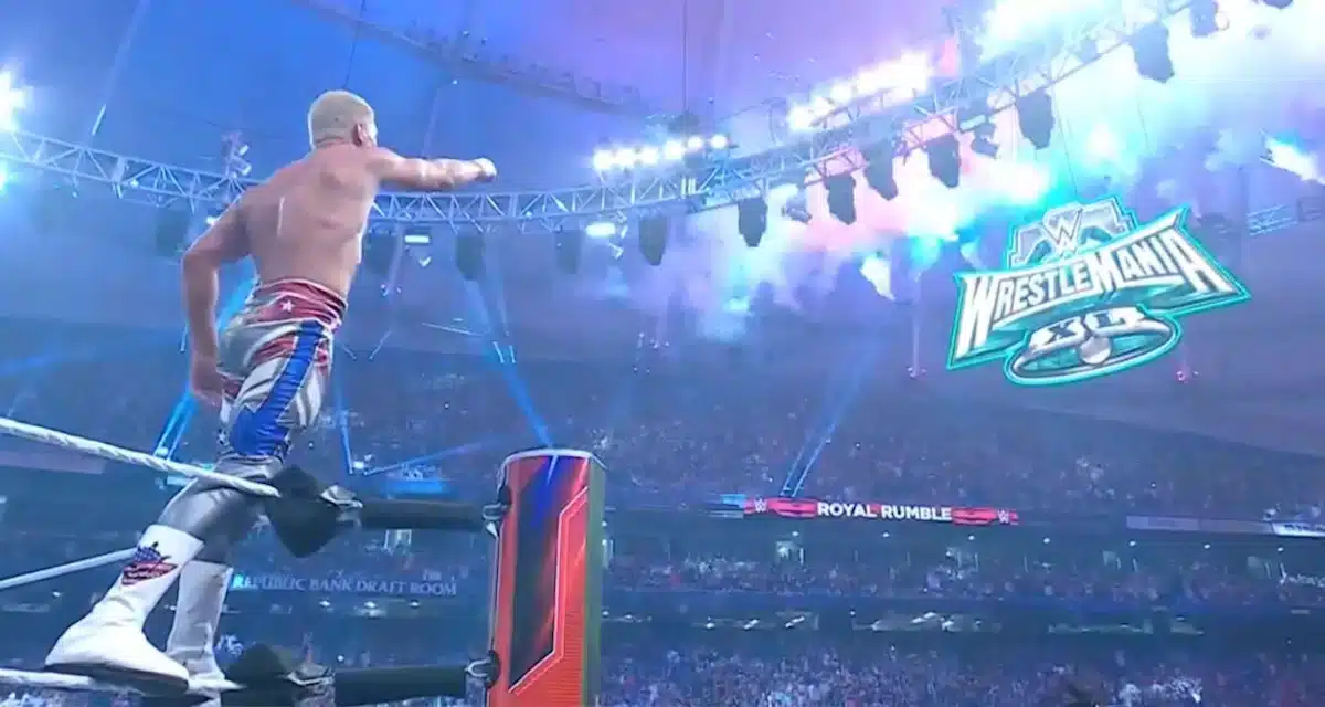 Cody Rhodes wins the Men's Royal Rumble 2024 and is poiting to the Wrestlemania XL banner at Tropicana Field