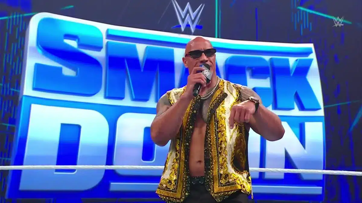 The Rock Electrifies Smackdown, speaking to the crowd from the ring