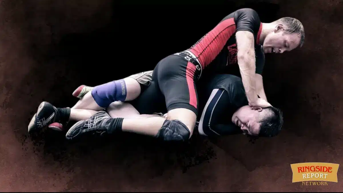 Two Men practising Catch As Catch Can Wrestling on a Mat