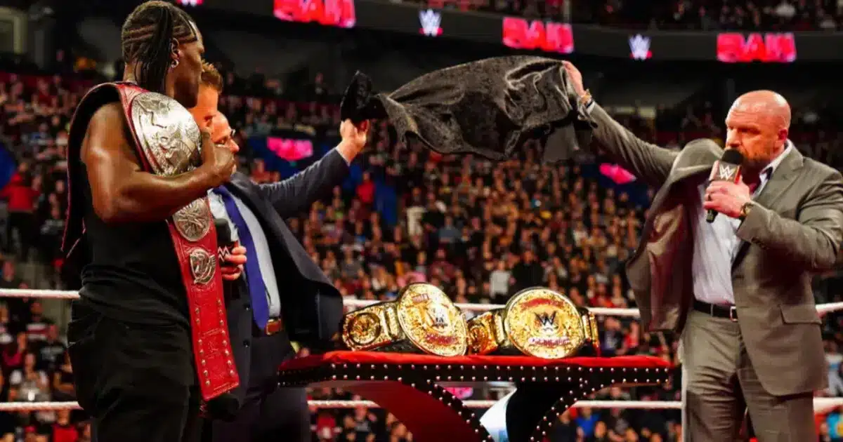 Triple H in the ring at WWE Raw in Montreal unveils New World Tag Team Titles