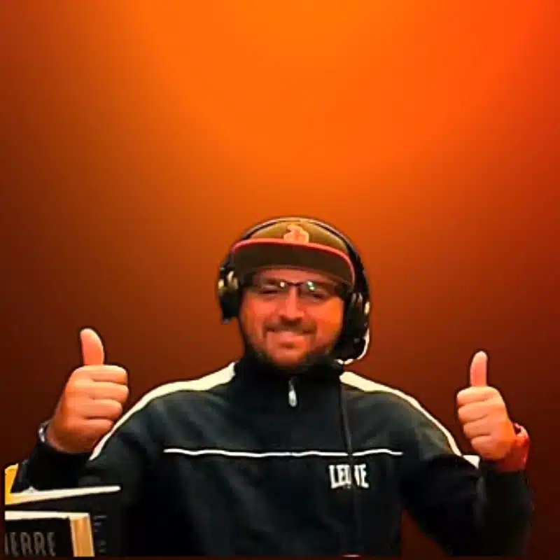 AJ D’Alesio on an orange background Aj D'Alesio On An Orange Background