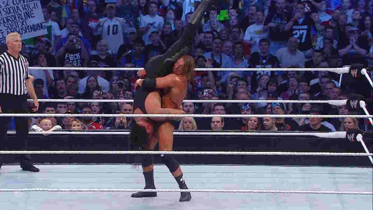 Triple H applies The Undertaker's finisher