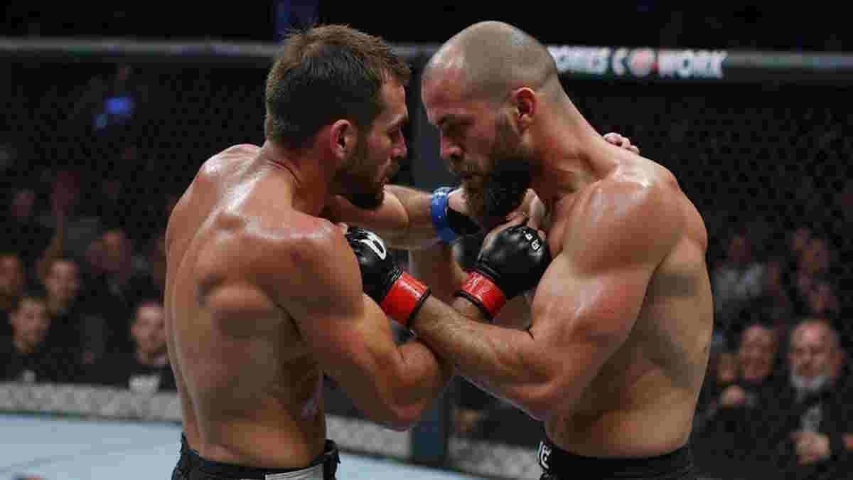 Two fighters Clinching in MMA