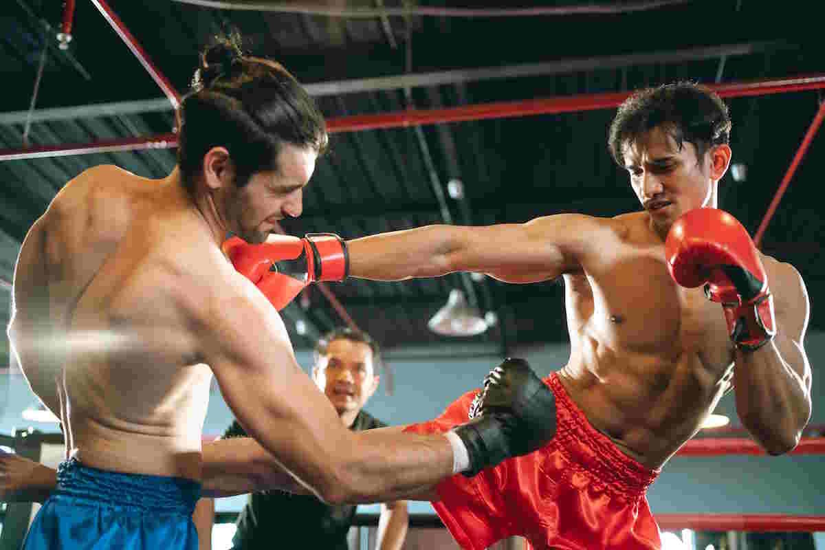 Boxing Vs Muay Thai Two Fighters In A Combat Sport Match.